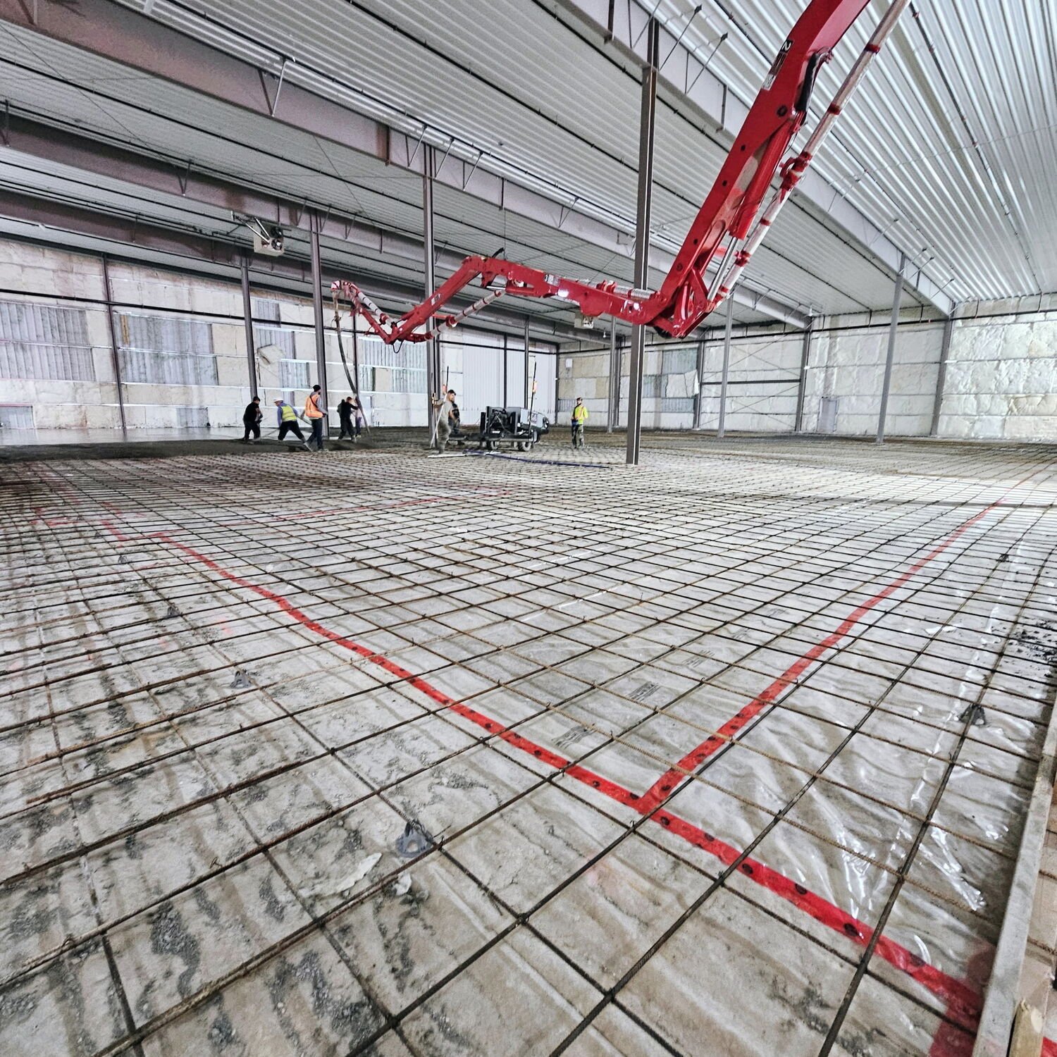 In-floor radiant heating installed over a poured slab.